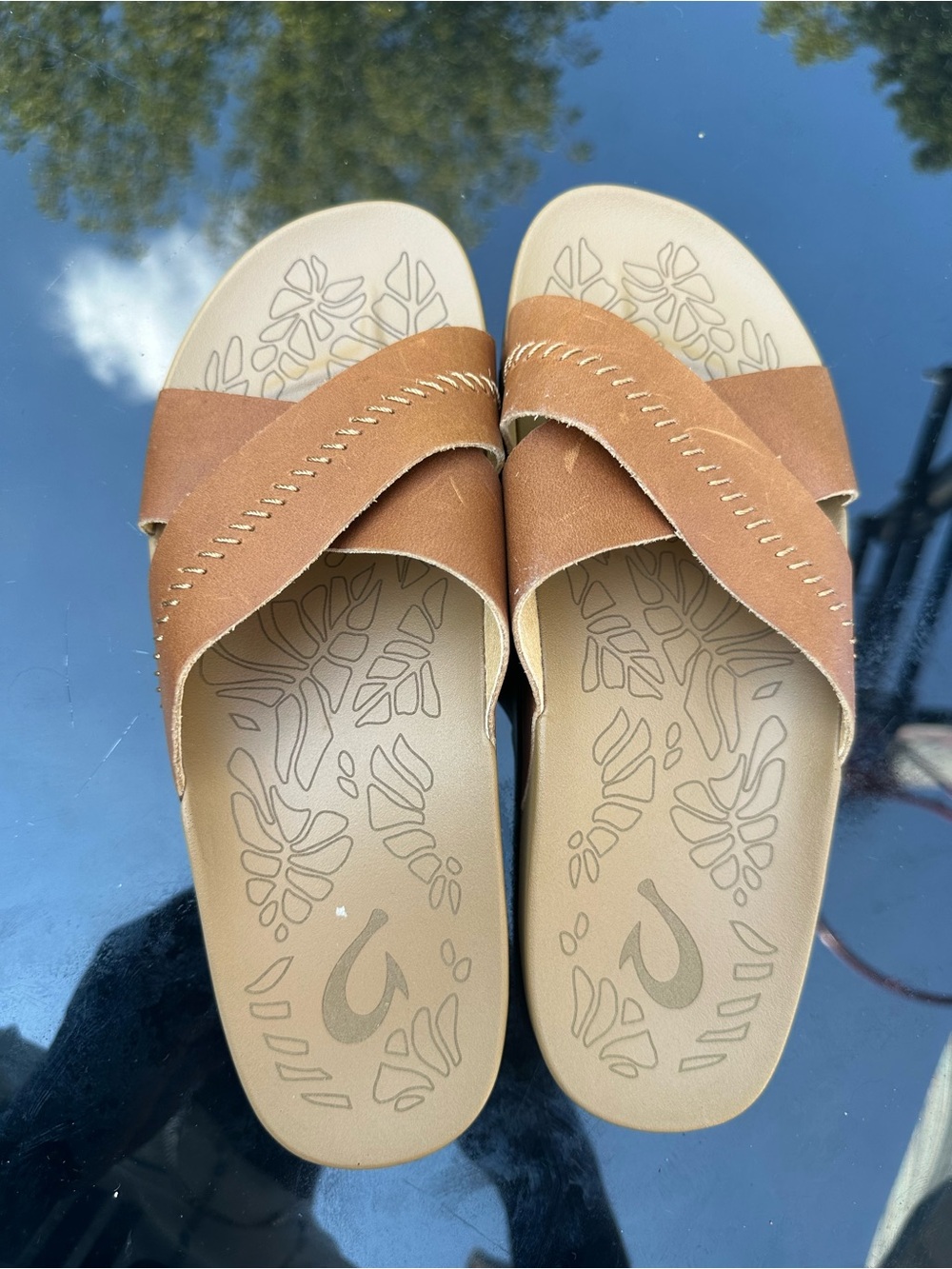Olukai Slide Sandals in Brown